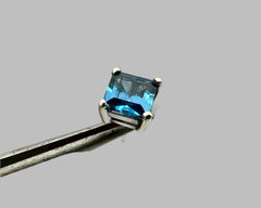 SINGLE BLUE DREAM STUD TOPAZ AND WHITE GOLD